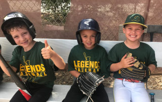 Legends Baseball players encouraging each other